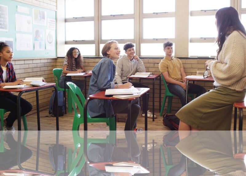 Teacher with students